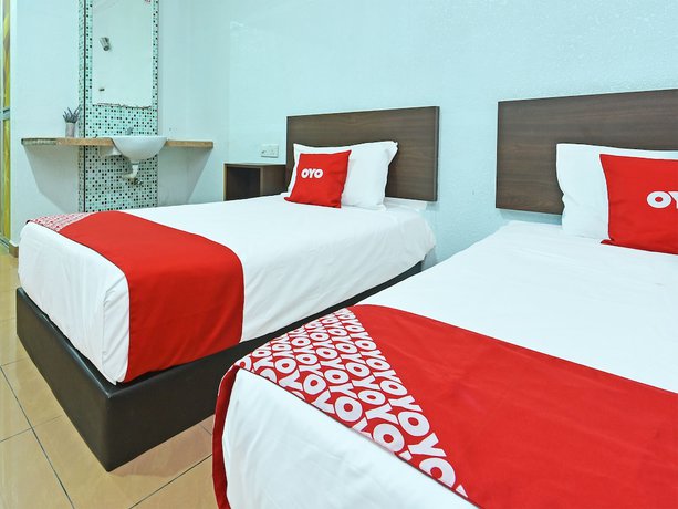 Imagen de la habitación del Hotel OYO 90559 Ummul Motel C Mart. Foto 6