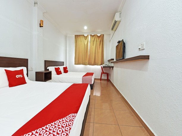 Imagen de la habitación del Hotel OYO 90559 Ummul Motel C Mart. Foto 7