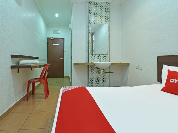 Imagen de la habitación del Hotel OYO 90559 Ummul Motel C Mart. Foto 8