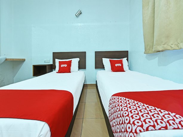 Imagen de la habitación del Hotel OYO 90559 Ummul Motel C Mart. Foto 9