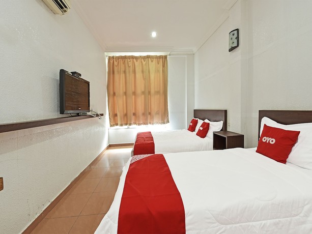 Imagen de la habitación del Hotel OYO 90559 Ummul Motel C Mart. Foto 10