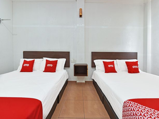 Imagen de la habitación del Hotel OYO 90559 Ummul Motel C Mart. Foto 11