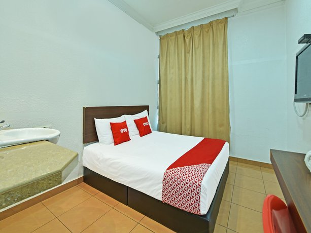 Imagen de la habitación del Hotel OYO 90559 Ummul Motel C Mart. Foto 12