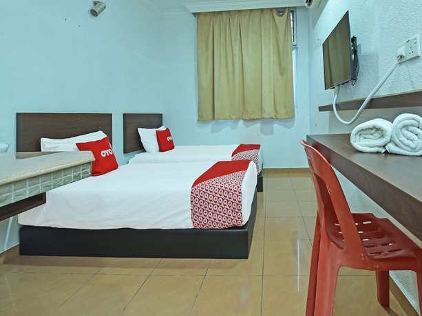 Imagen de la habitación del Hotel OYO 90559 Ummul Motel C Mart. Foto 15
