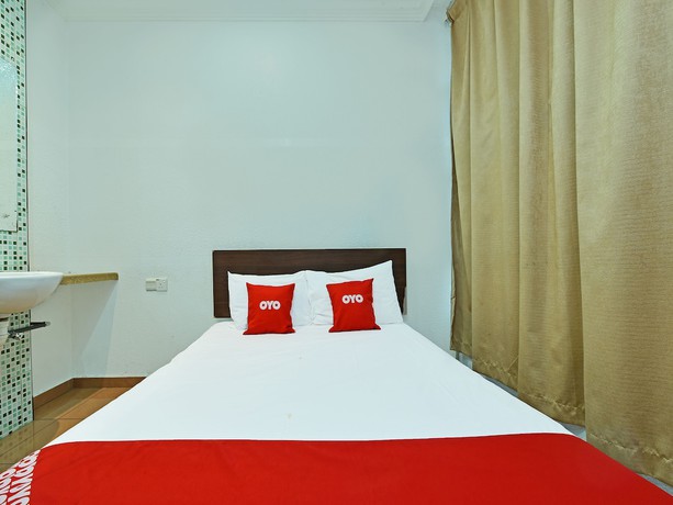 Imagen de la habitación del Hotel OYO 90559 Ummul Motel C Mart. Foto 16