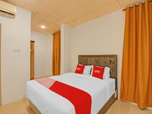 Imagen de la habitación del Hotel OYO 90561 Paris Street Residence Syariah. Foto 19