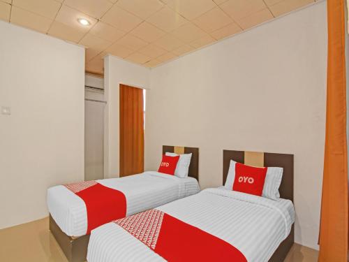 Imagen de la habitación del Hotel OYO 90561 Paris Street Residence Syariah. Foto 20
