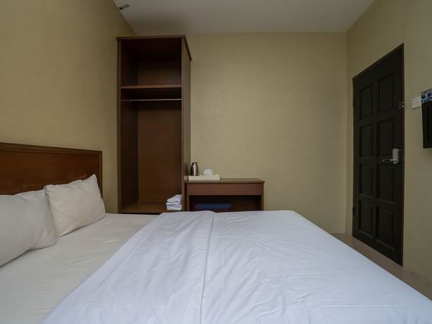 Imagen de la habitación del Hotel OYO 90568 Sutera Inanam. Foto 3