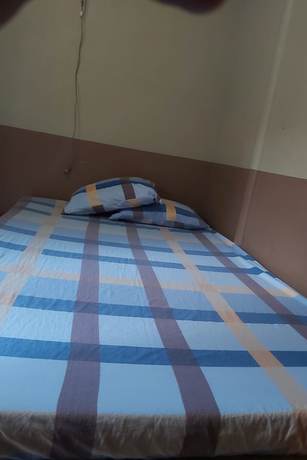 Imagen de la habitación del Hotel OYO 906 Cas Elixir Resort. Foto 5