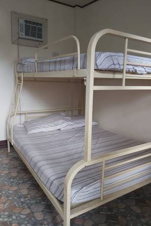 Imagen de la habitación del Hotel OYO 906 Cas Elixir Resort. Foto 6