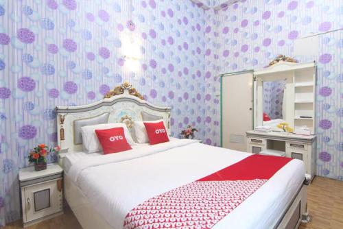 Imagen de la habitación del Hotel OYO 90615 Jojo Homestay. Foto 18
