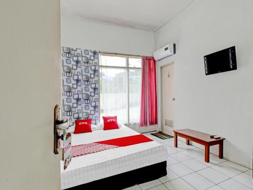 Imagen de la habitación del Hotel OYO 90621 Pondok 23, Jatinangor. Foto 20