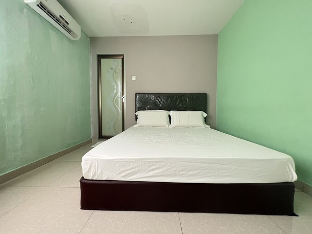 Imagen de la habitación del Hotel OYO 90621 Stutong Stay. Foto 2