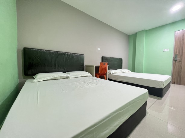 Imagen de la habitación del Hotel OYO 90621 Stutong Stay. Foto 6