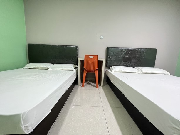 Imagen de la habitación del Hotel OYO 90621 Stutong Stay. Foto 7