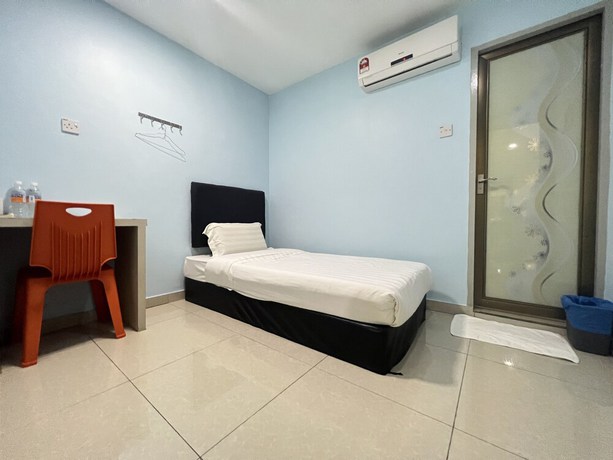 Imagen de la habitación del Hotel OYO 90621 Stutong Stay. Foto 9