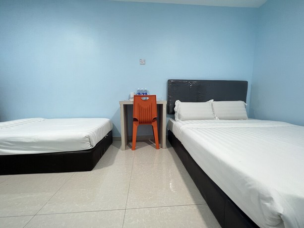 Imagen de la habitación del Hotel OYO 90621 Stutong Stay. Foto 12