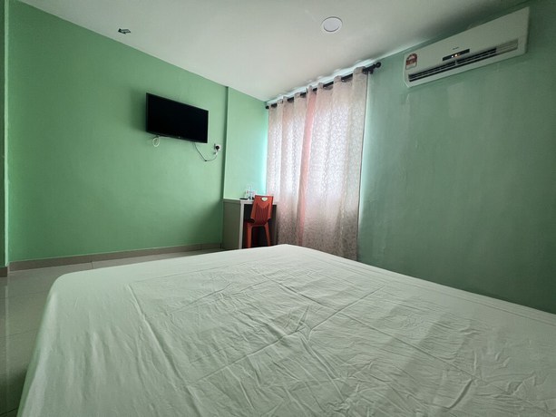 Imagen de la habitación del Hotel OYO 90621 Stutong Stay. Foto 13