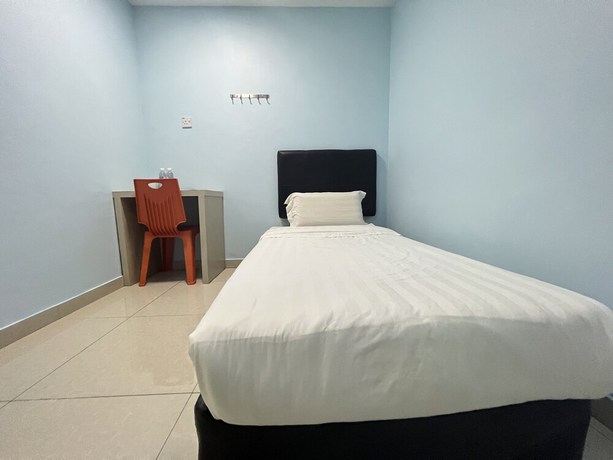 Imagen de la habitación del Hotel OYO 90621 Stutong Stay. Foto 14
