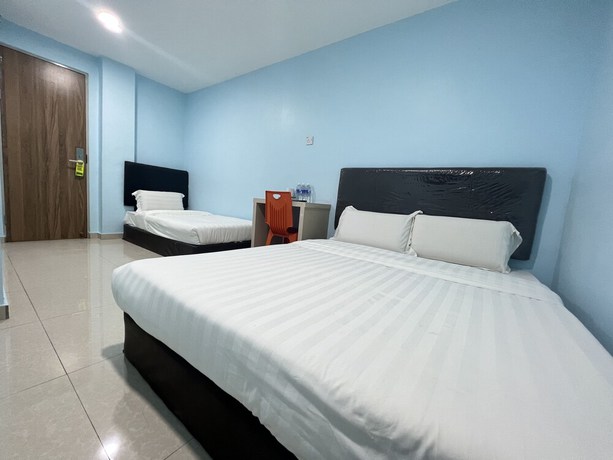 Imagen de la habitación del Hotel OYO 90621 Stutong Stay. Foto 15