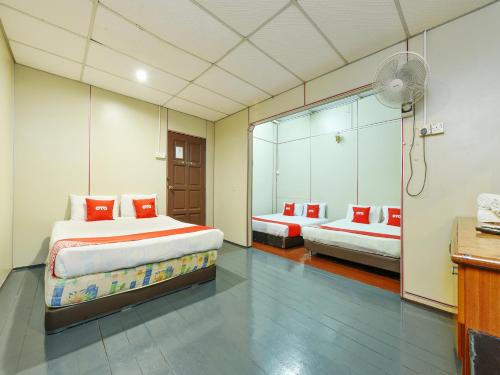Imagen de la habitación del Hotel OYO 90627 Pulau Ketam Inn. Foto 17