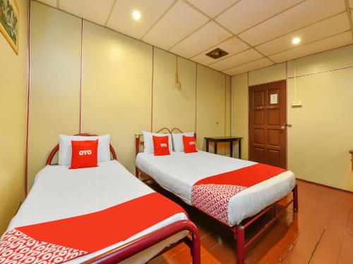 Imagen de la habitación del Hotel OYO 90627 Pulau Ketam Inn. Foto 18