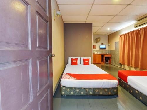 Imagen de la habitación del Hotel OYO 90627 Pulau Ketam Inn. Foto 19