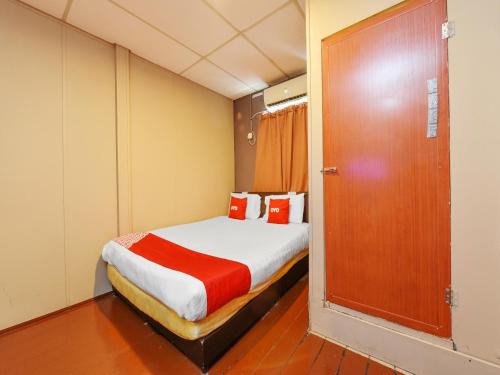 Imagen de la habitación del Hotel OYO 90627 Pulau Ketam Inn. Foto 20