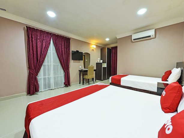 Imagen de la habitación del Hotel OYO 90642 Twin Mutiara Chalet andHomestay. Foto 2