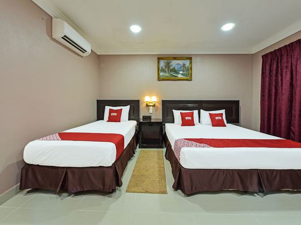 Imagen de la habitación del Hotel OYO 90642 Twin Mutiara Chalet andHomestay. Foto 4