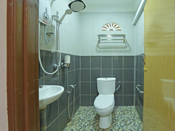 Imagen de la habitación del Hotel OYO 90642 Twin Mutiara Chalet andHomestay. Foto 9