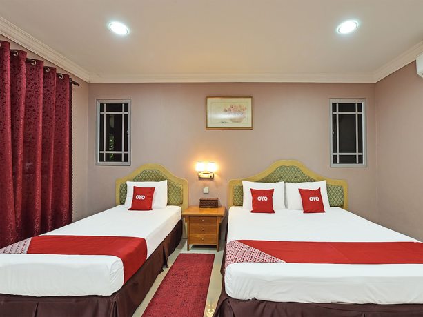 Imagen de la habitación del Hotel OYO 90642 Twin Mutiara Chalet andHomestay. Foto 13
