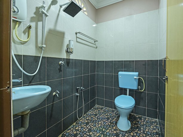 Imagen de la habitación del Hotel OYO 90642 Twin Mutiara Chalet andHomestay. Foto 15