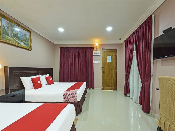 Imagen de la habitación del Hotel OYO 90642 Twin Mutiara Chalet andHomestay. Foto 17