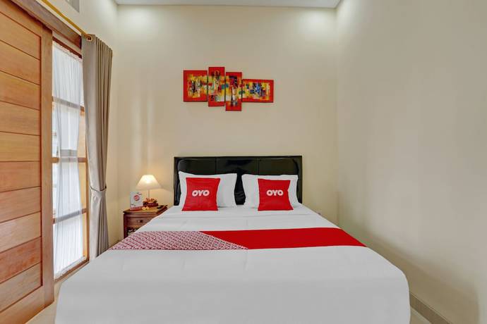 Imagen de la habitación del Hotel OYO 90654 Pondok Wisata Buana Amerta. Foto 6