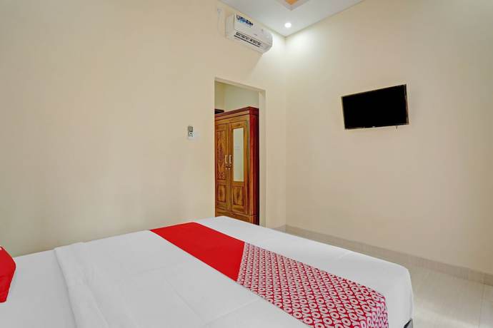 Imagen de la habitación del Hotel OYO 90654 Pondok Wisata Buana Amerta. Foto 8