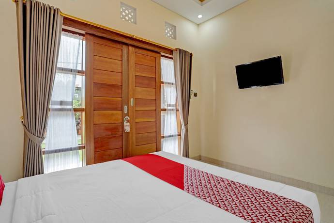 Imagen de la habitación del Hotel OYO 90654 Pondok Wisata Buana Amerta. Foto 9