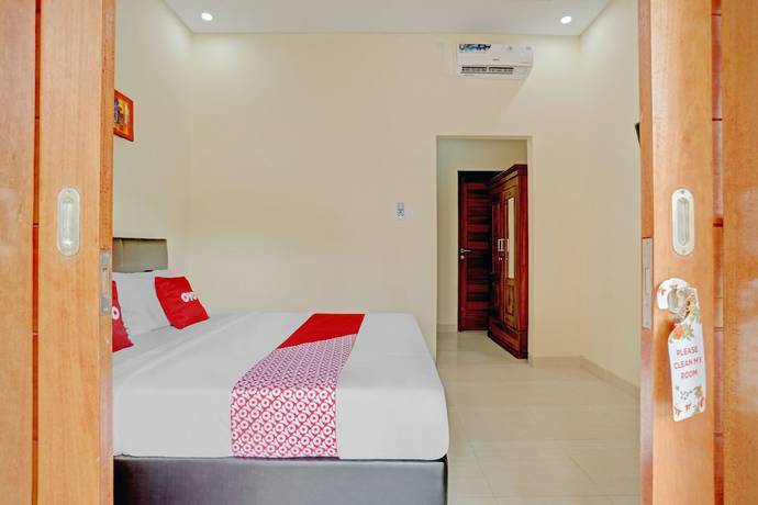 Imagen de la habitación del Hotel OYO 90654 Pondok Wisata Buana Amerta. Foto 10