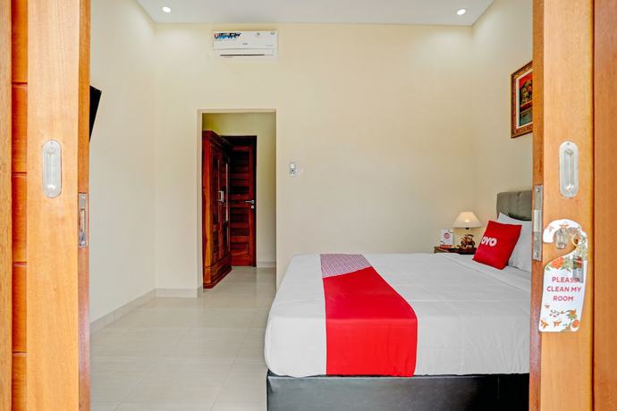 Imagen de la habitación del Hotel OYO 90654 Pondok Wisata Buana Amerta. Foto 11