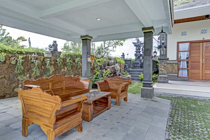 Imagen de los interiores del Hotel OYO 90654 Pondok Wisata Buana Amerta. Foto 17