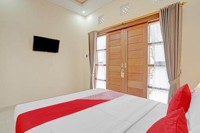 Imagen de la habitación del Hotel OYO 90654 Pondok Wisata Buana Amerta. Foto 12
