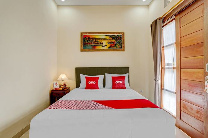 Imagen de la habitación del Hotel OYO 90654 Pondok Wisata Buana Amerta. Foto 13