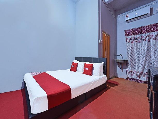 Imagen de la habitación del Hotel OYO 90664 Rabi. Foto 3