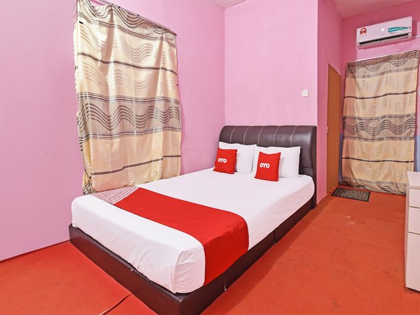 Imagen de la habitación del Hotel OYO 90664 Rabi. Foto 7