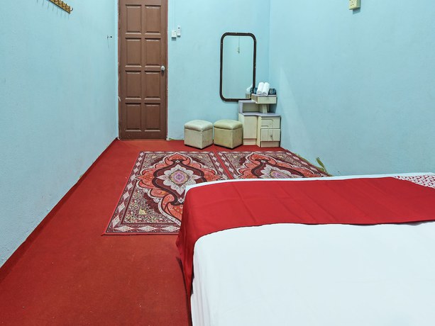 Imagen de la habitación del Hotel OYO 90664 Rabi. Foto 9
