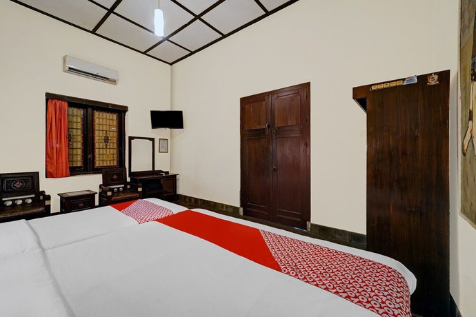 Imagen de la habitación del Hotel OYO 90676 Oryza. Foto 3
