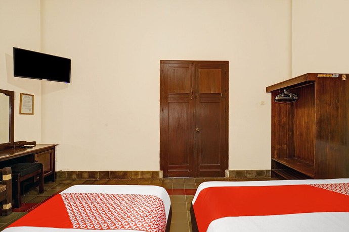 Imagen de la habitación del Hotel OYO 90676 Oryza. Foto 4