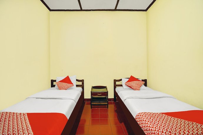 Imagen de la habitación del Hotel OYO 90676 Oryza. Foto 5