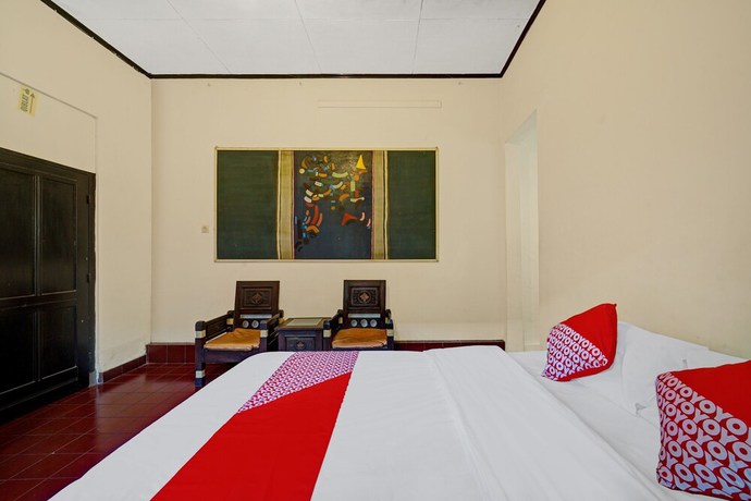Imagen de la habitación del Hotel OYO 90676 Oryza. Foto 6