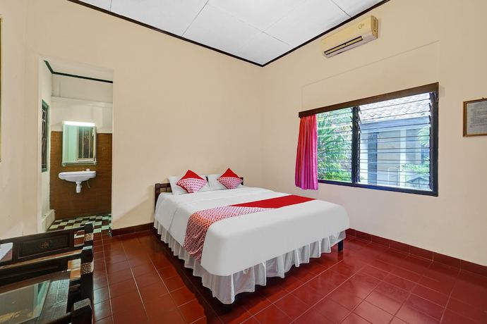 Imagen de la habitación del Hotel OYO 90676 Oryza. Foto 8